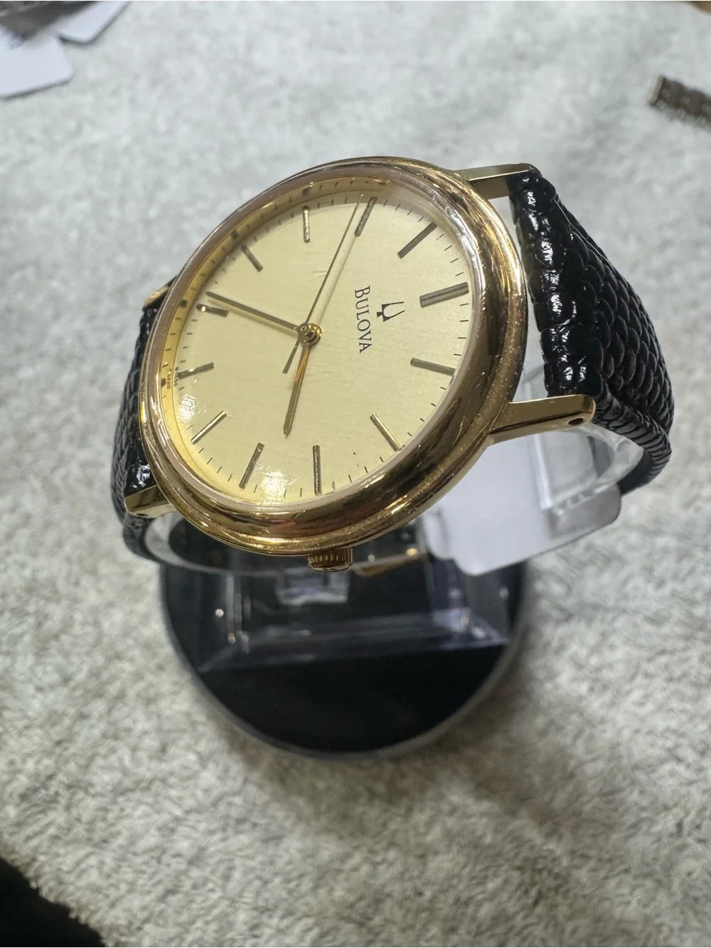 Bulova Gold Dial Men's Watch with Black Leather Strap